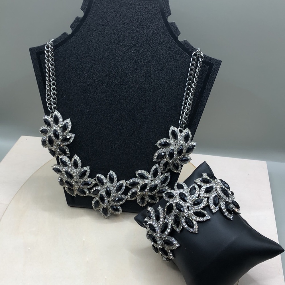 Bejeweled statement style jewelry set necklace and bracelet.